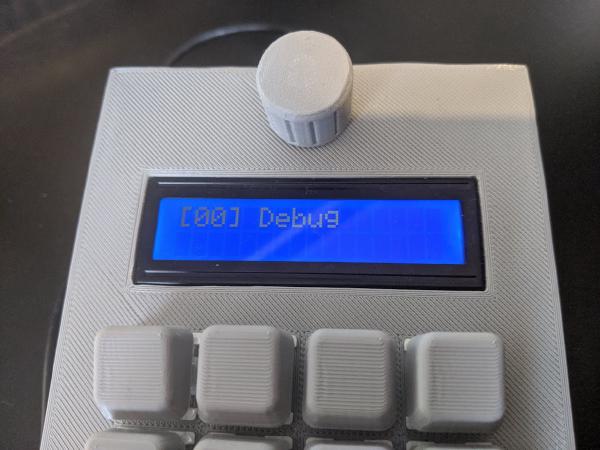 Close-up of the LCD with the text [00] Debug