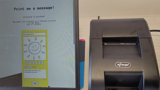 A video showing a user submitting a message in the website. On the computer's side there is a printer that prints the message.