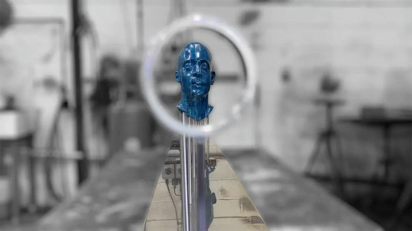 The resulting blue sculpture head when seeing from the vantage point.
